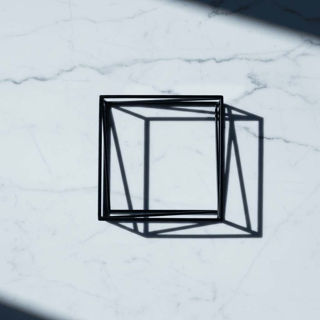 Sleek matte black metal frames on marble